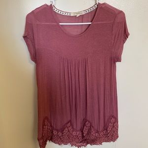 Pink blouse with lace bottom
